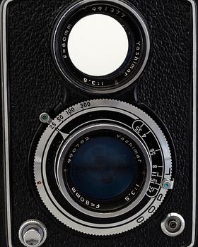 A Yashica-A and a Robot Star camera, mid 20th century.