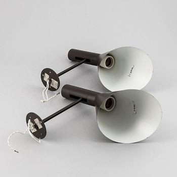 Arne Jacobsen, a pair of 'AJ'-wall lights, Louis Poulsen, Denmark, designed 1959.