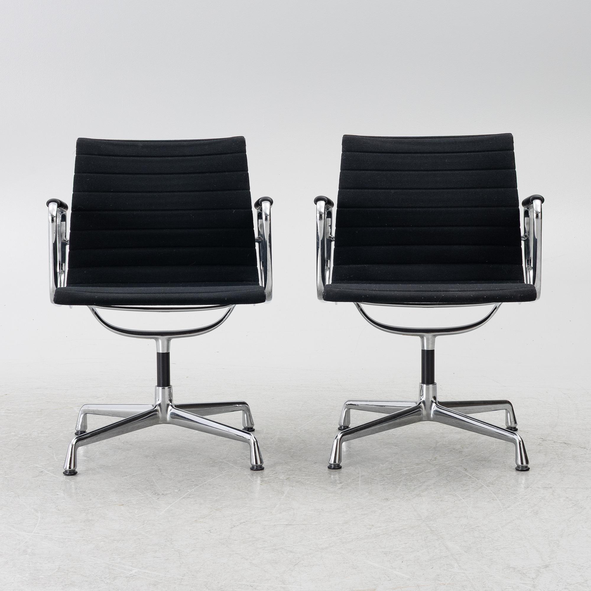 Charles & Ray Eames, A pair of EA 108 armchairs, Vitra.