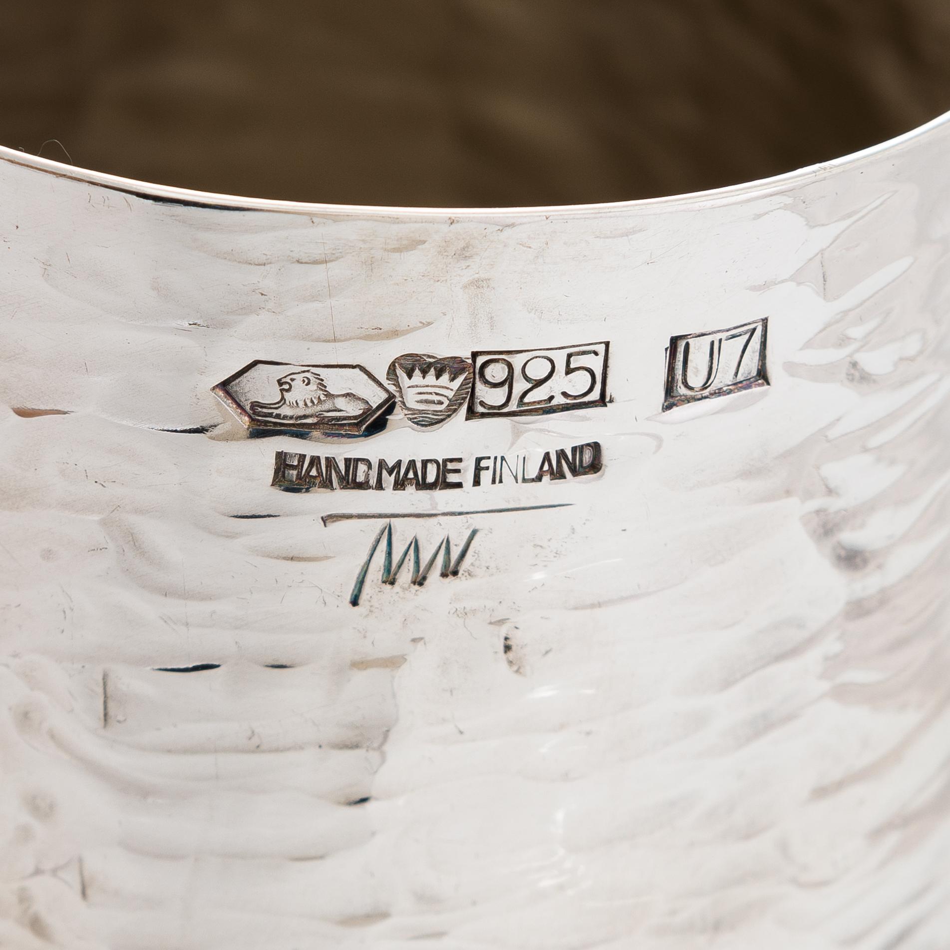 Tapio Wirkkala, a silver pitcher with six silver beakers, marked TW, Kultakeskus, Hämeenlinna Finland 1973 and 1966.