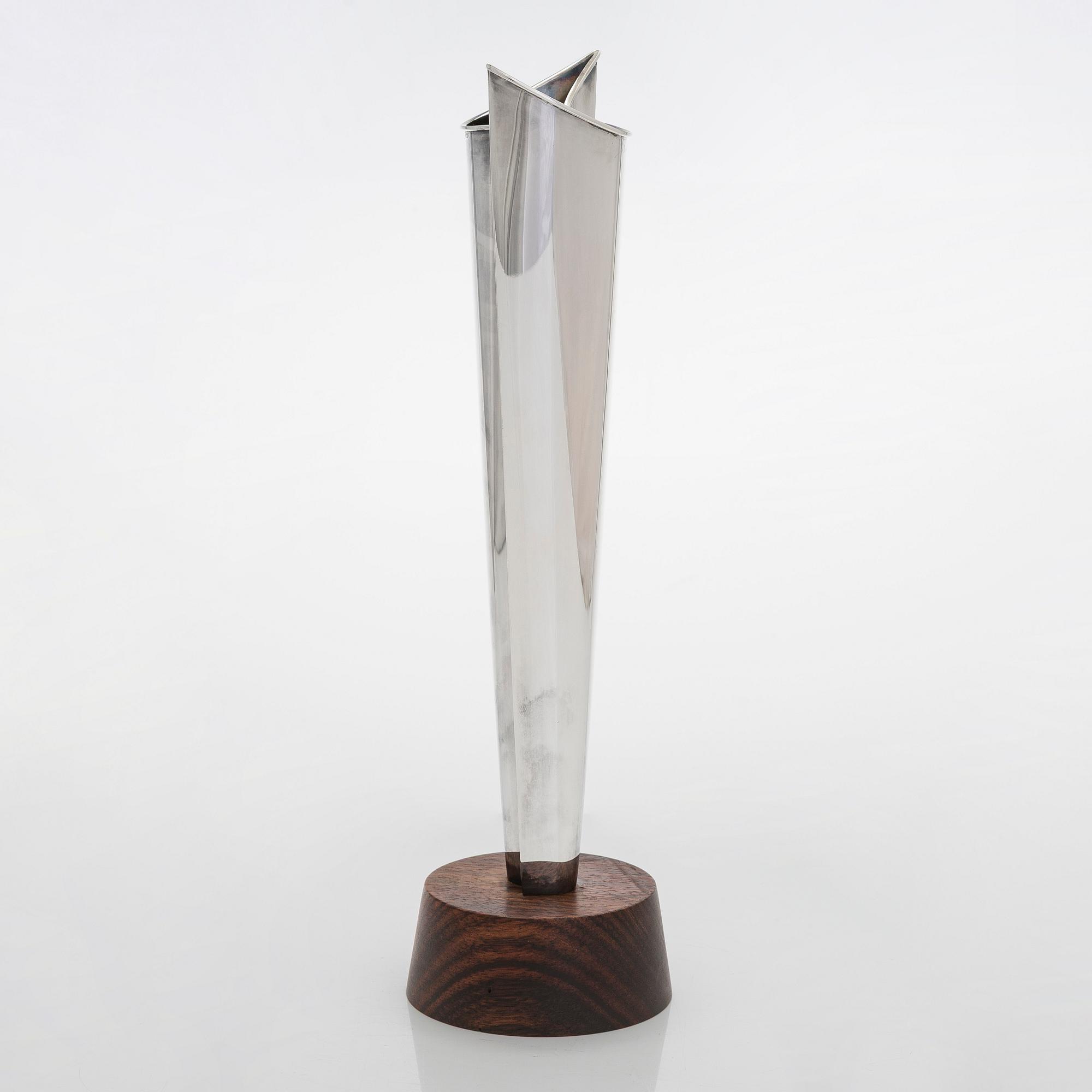 Tapio Wirkkala, a silver TW 228 'Flame' vase on a rosewood base, Kultakeskus, Hämeenlinna 1965.