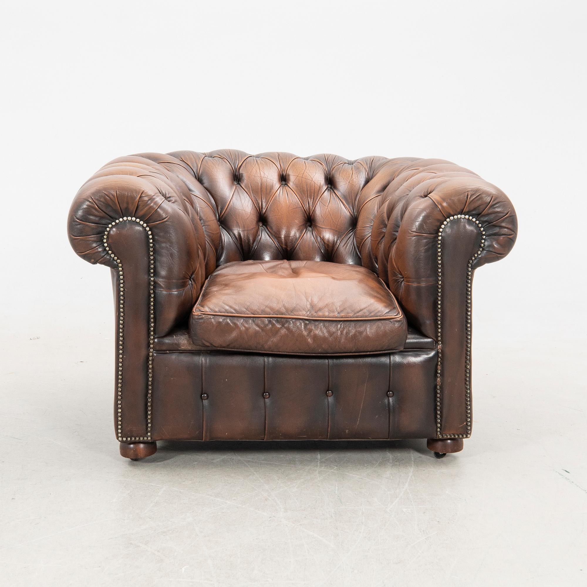 Sofa and armchair, Chesterfield, 20th century.