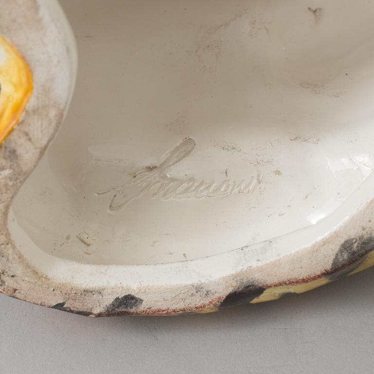 A pair of 70s italian porcelain figurines.