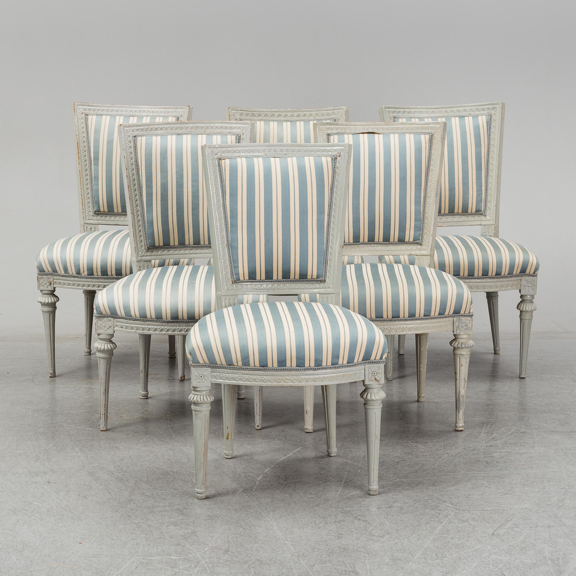 Six (3+2+1) late 18th century Gustavian chairs.