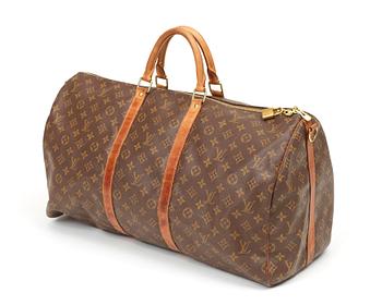 572. A monogram canvas bag by Louis Vuitton,