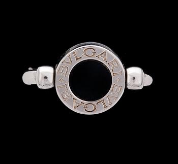1151. A Bulgari diamond and onyx ring.