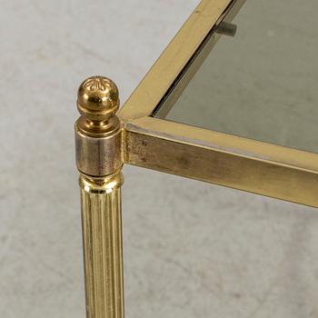 A brass and glass coffee table from the second half of the 20th century.