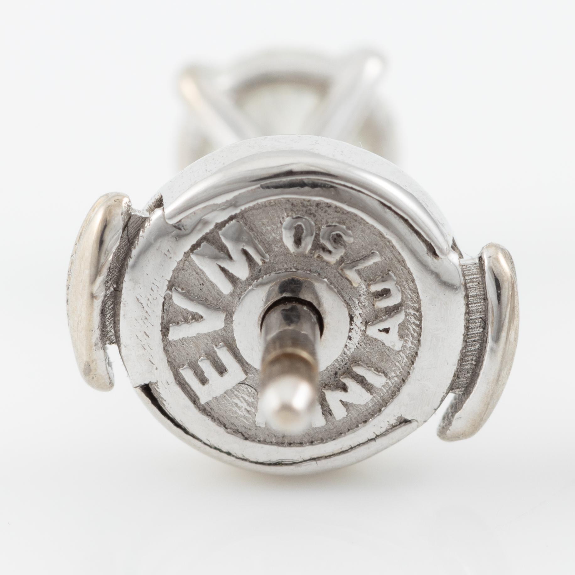 Earrings, 18K white gold with brilliant-cut diamonds.