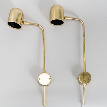 A pair of brass wall lights by Bergboms.