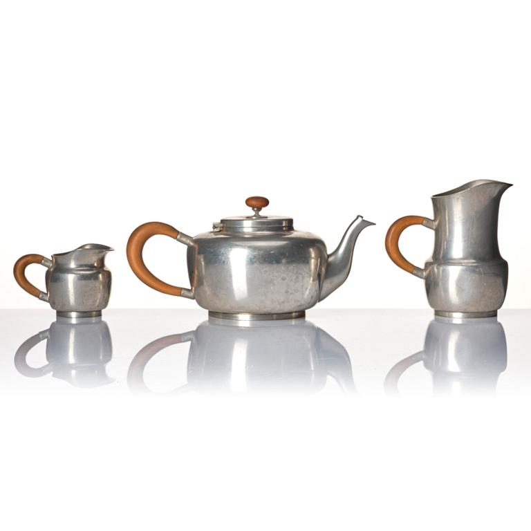 Josef Frank, a four pieces pewter tea service and a tray, model "A2330", Svenskt Tenn, Stockholm 1946 (tray 1929).