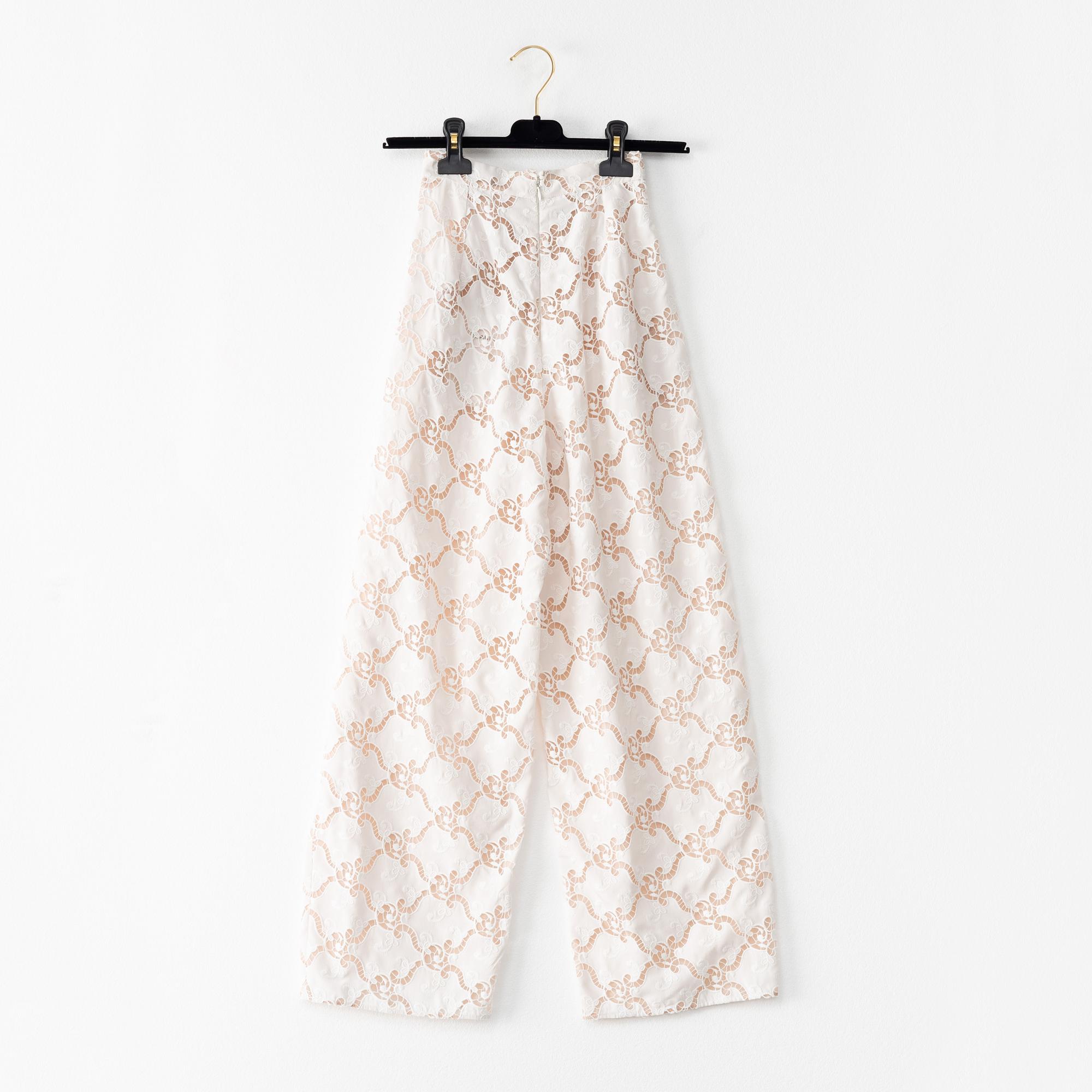 Chanel, a pair of cotton and silk pants, french size 34.