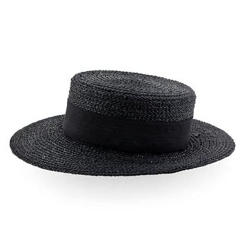 CHANEL, a black straw hat.