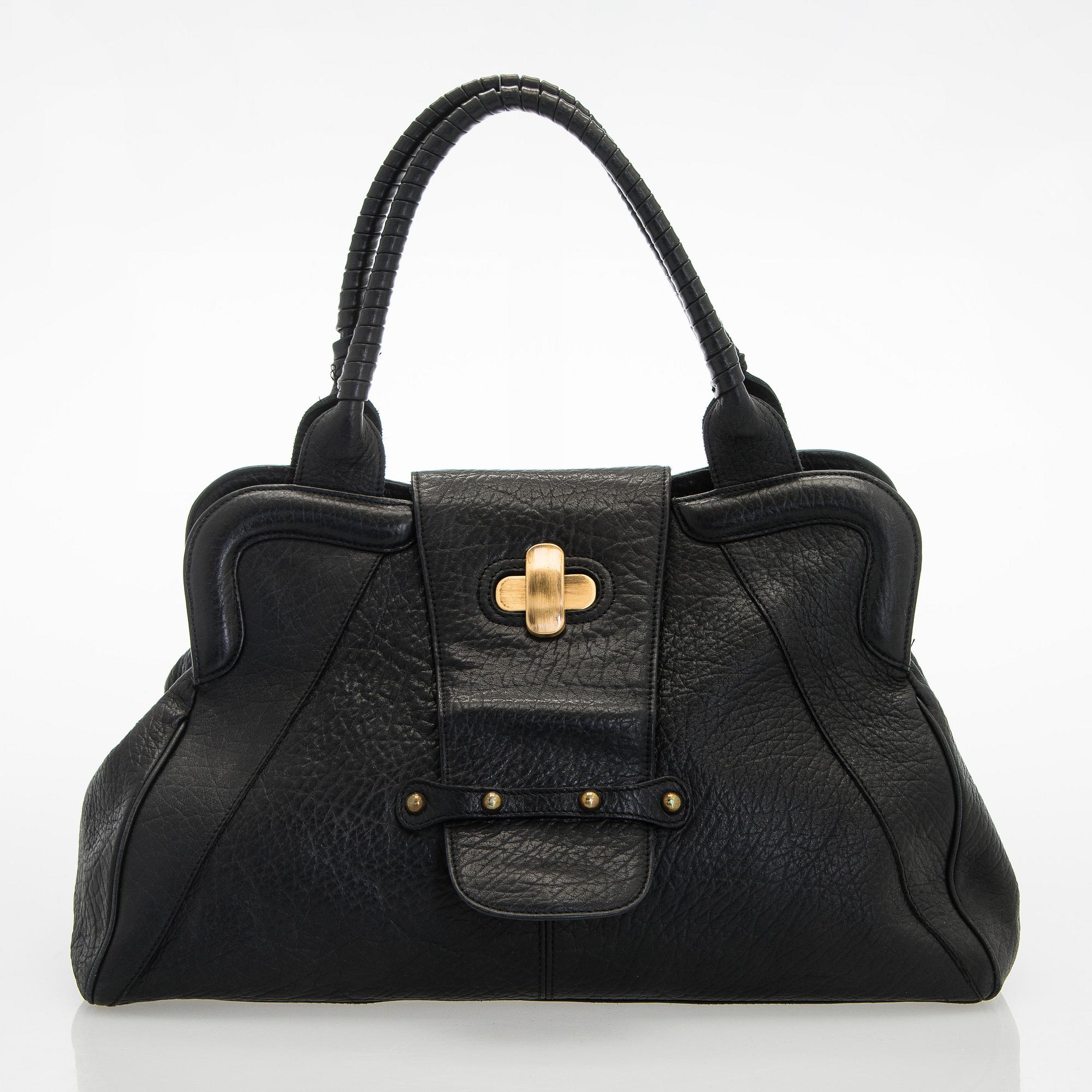 Max Mara, a leather handbag.