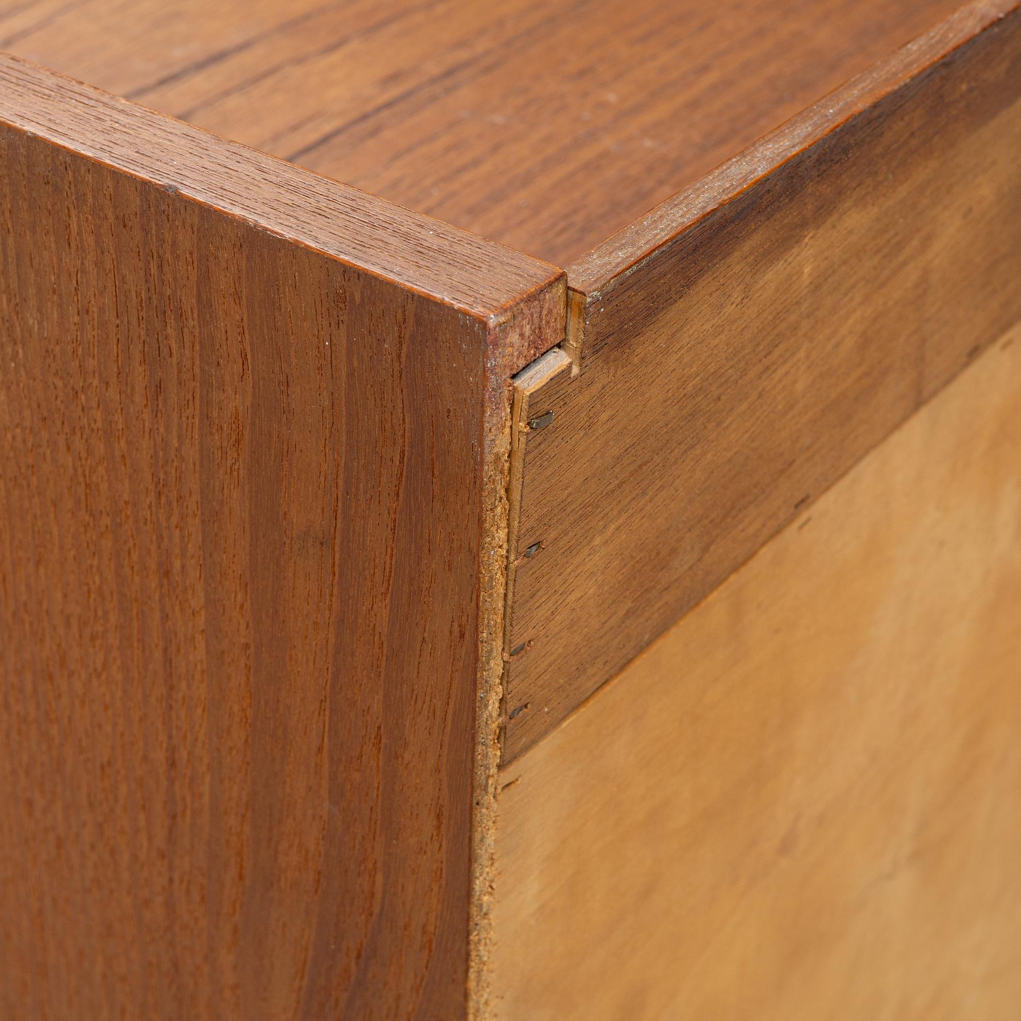 A teak writing desk, 1950-60s.