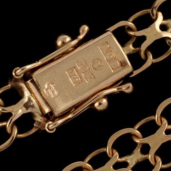 BERLOCKARMBAND, 18k guld samt emalj, Bäckman & Co, Stockholm, 1973. Vikt 9 g.