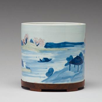 An underglaze blue, copper-red and celadon-glazed brushpot, Qing dynasty, early 18th Century, with Chenghuas mark.