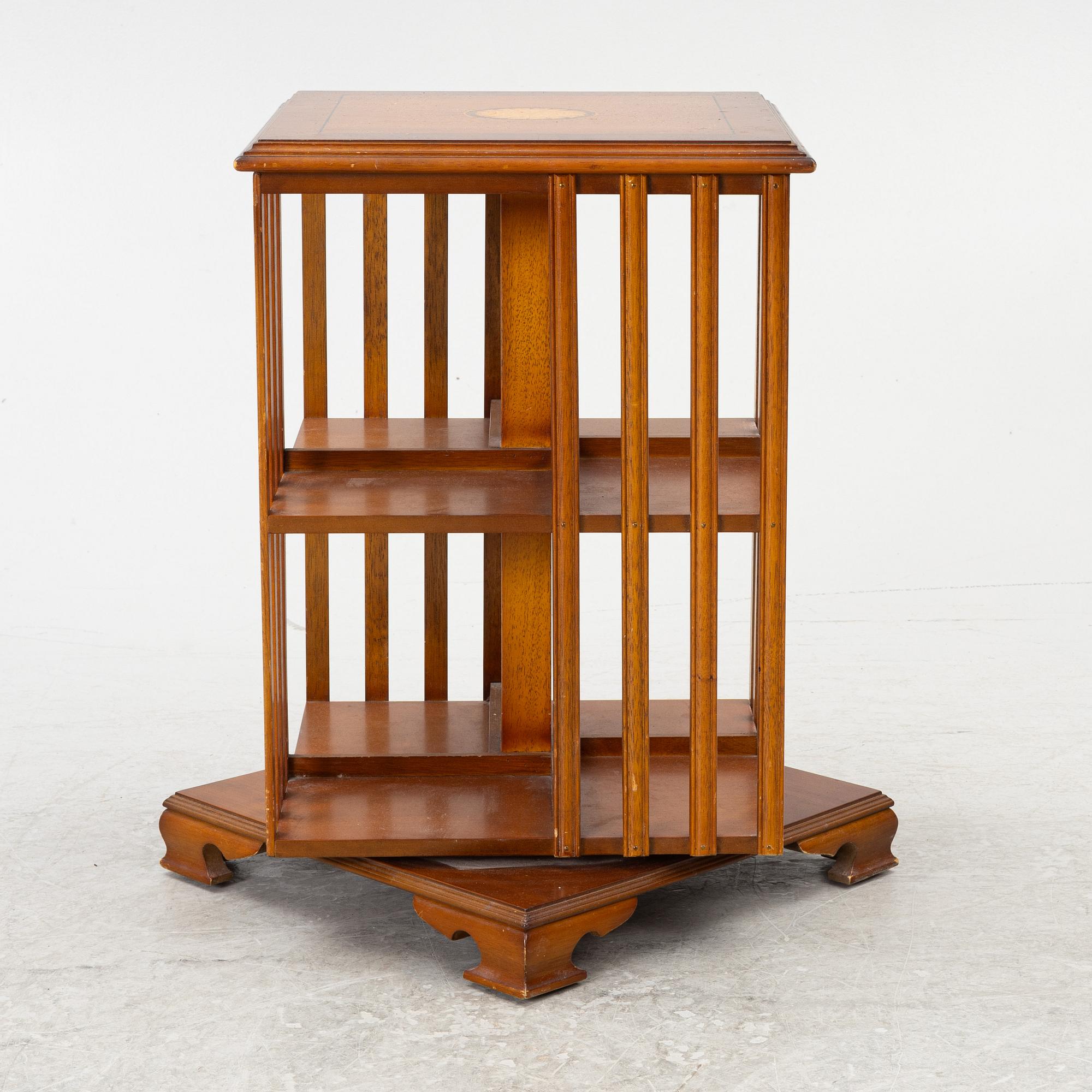 A revolving bookcase, late 20th century.
