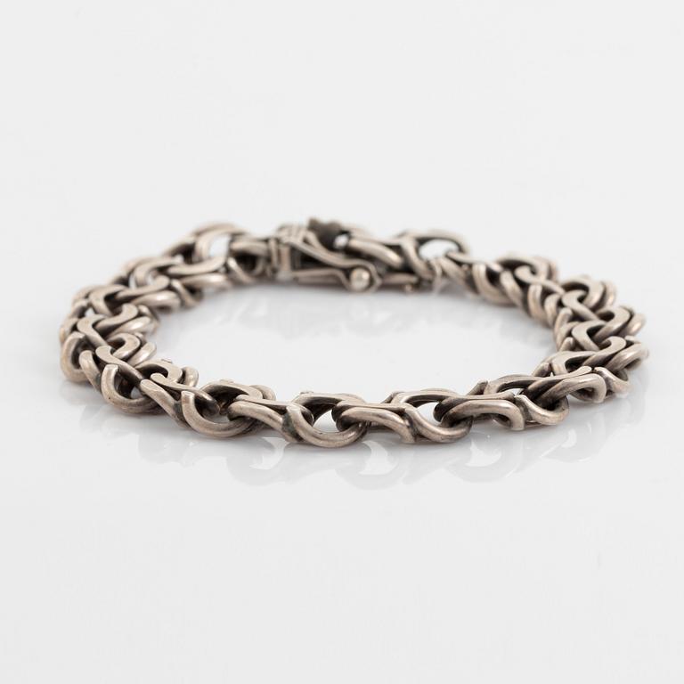 Silver bracelet.