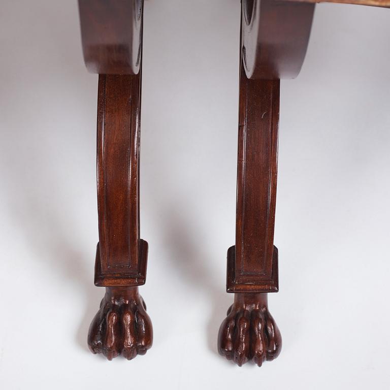 A pair of Directoire mahogany stools, circa 1800.