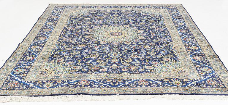 A carpet, semi.antique Kashmar, ca 342 x 242 cm.