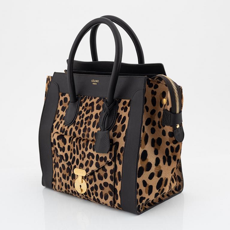 Céline, a leopard pony hair 'Mini shopper' bag.