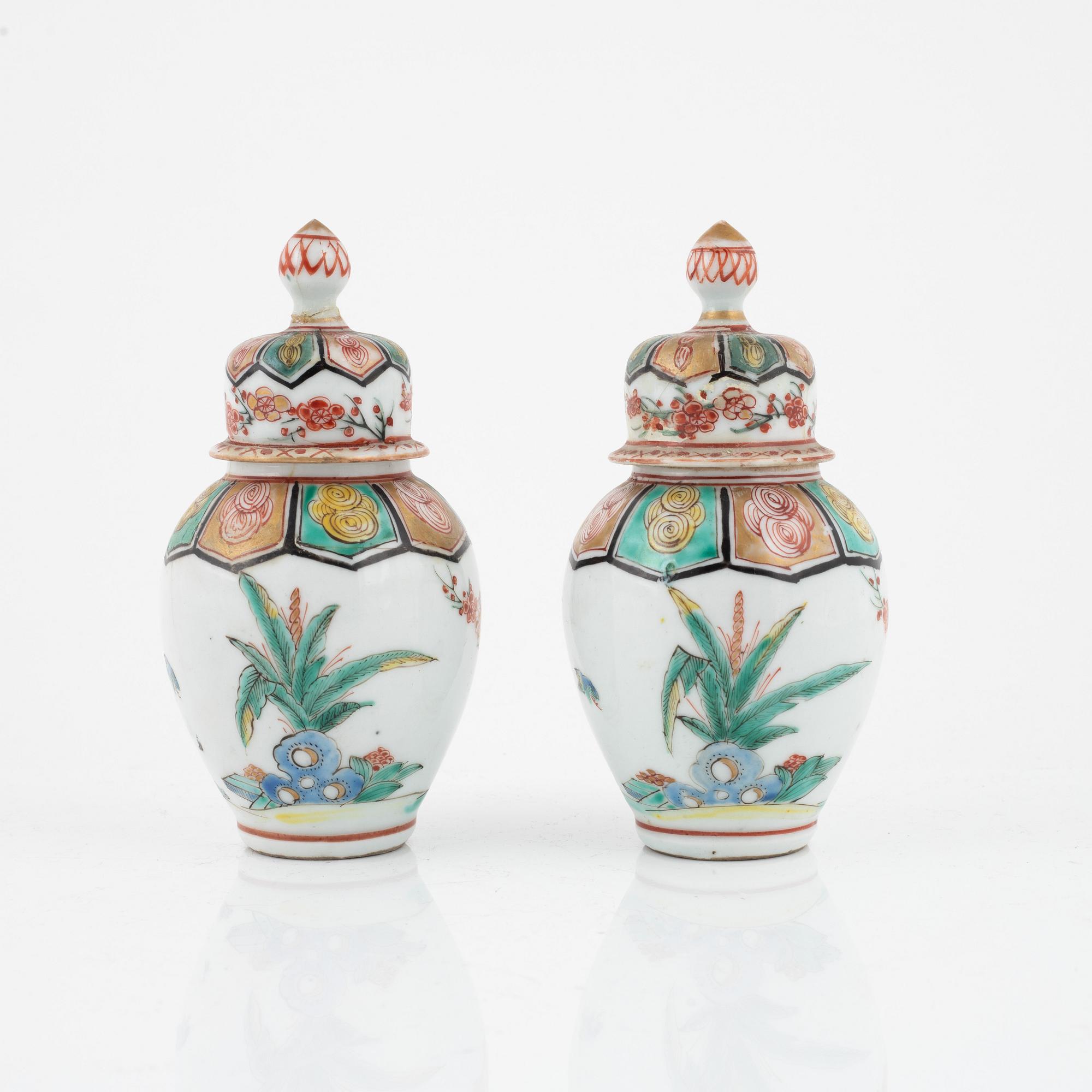 A pair of Japanese jars with covers, circa 1900.
