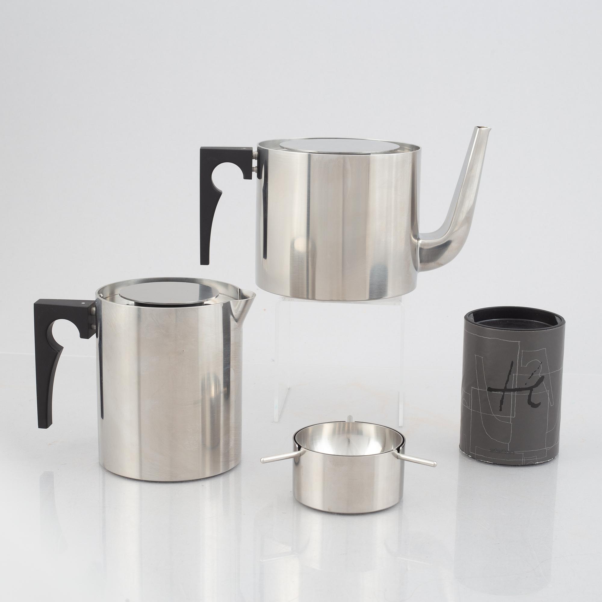 Arne Jacobsen, a 100-year jubilee "Cylinda" stainless steel tea set and a book, Stelton, Denmark, 2002.