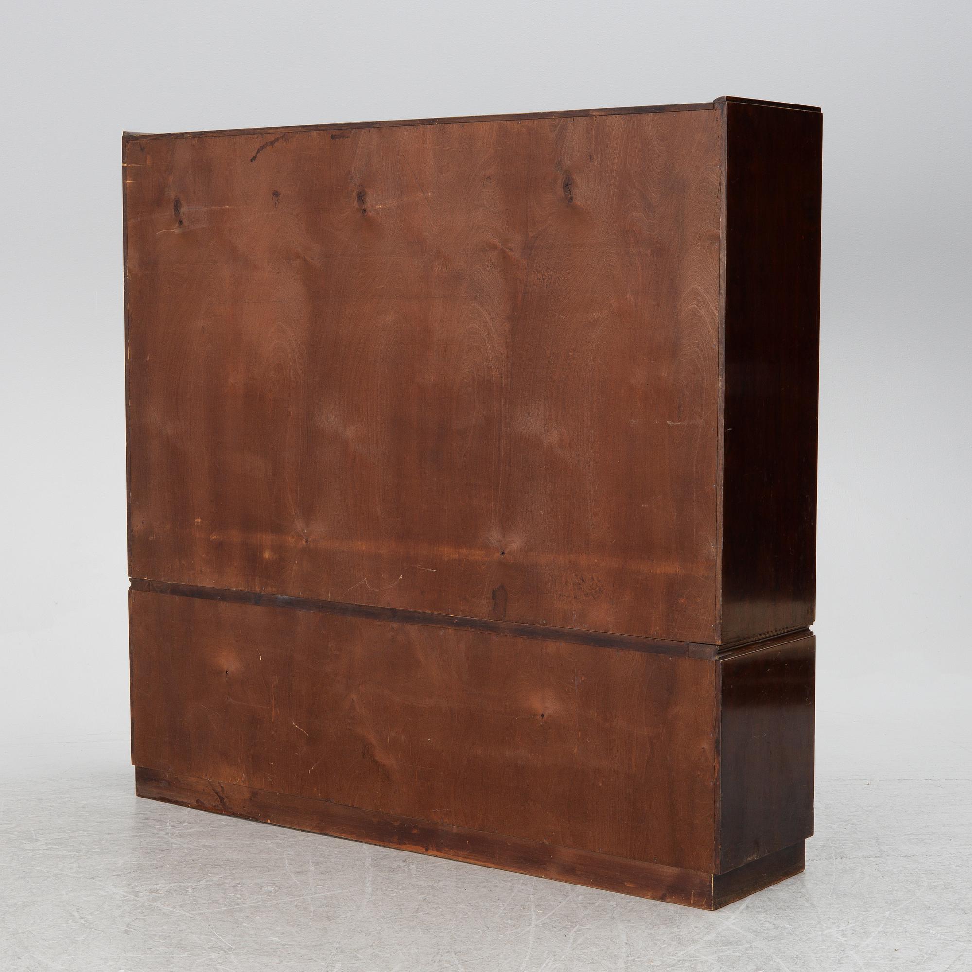 A bookcase with cabinet, 1930's.