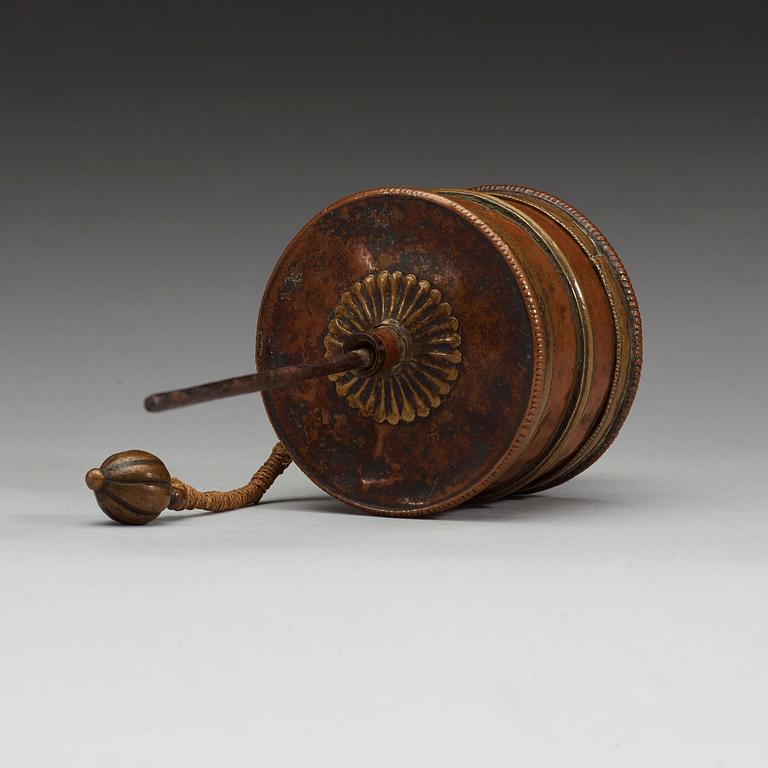 A copper and bronze prayer wheel, Tibet/Nepal ca 1900.
