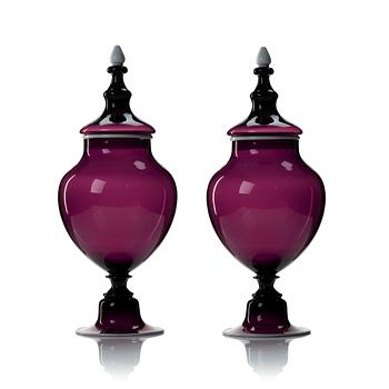 239. A pair of purple glass jars with covers, presumably Norway, 19th Century.