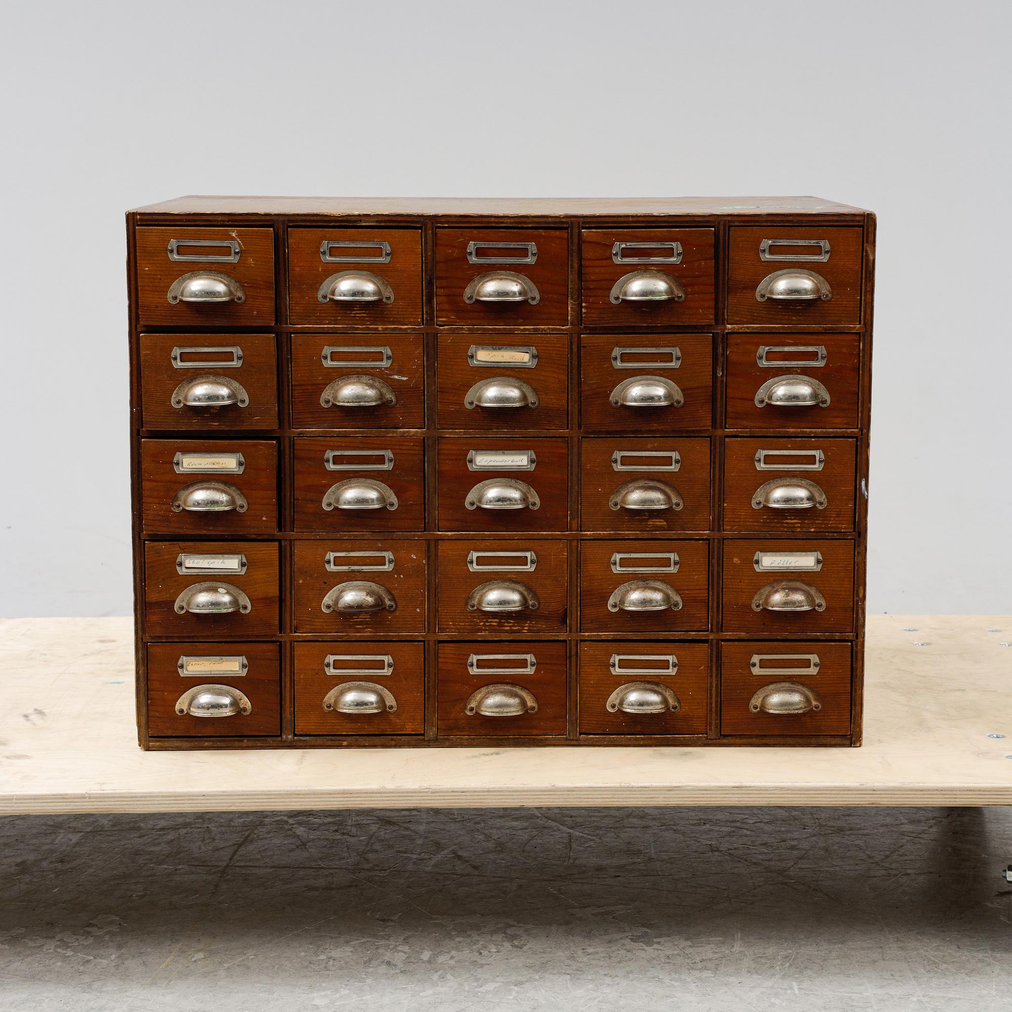 A pine cabinet with drawers, first half of the 20th Century.