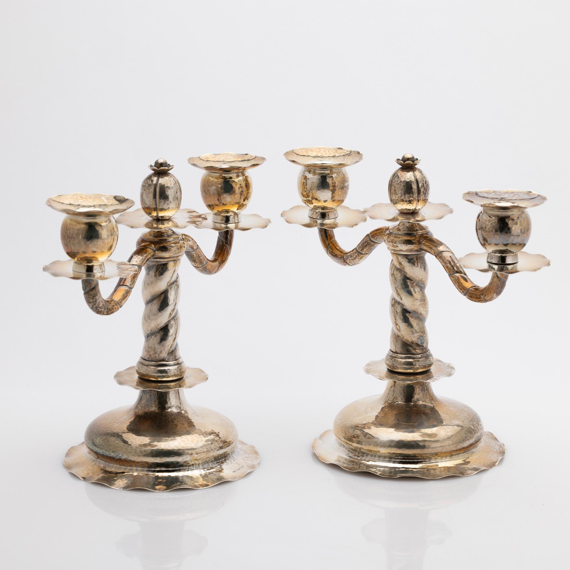 C.G. Hallberg, Pair of candelabra, silver, Stockholm, 1927.
