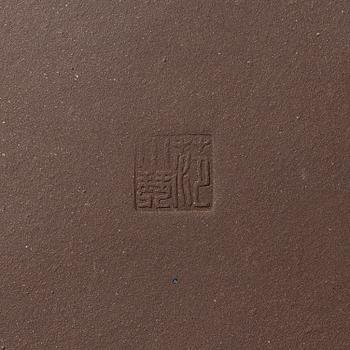 A group of four square yixing teapots, China, 1970/80s.