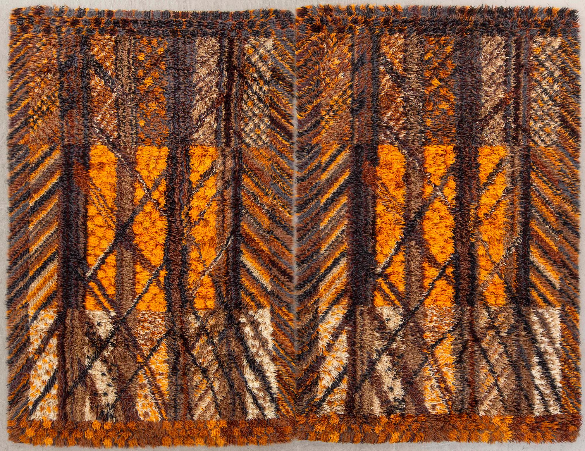 A pair of machine made long pile rugs ca 190 x 137 cm each.