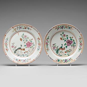 A pair of famille rose 'double peacock' dishes, Qing dynasty, Qianlong (1736-95).