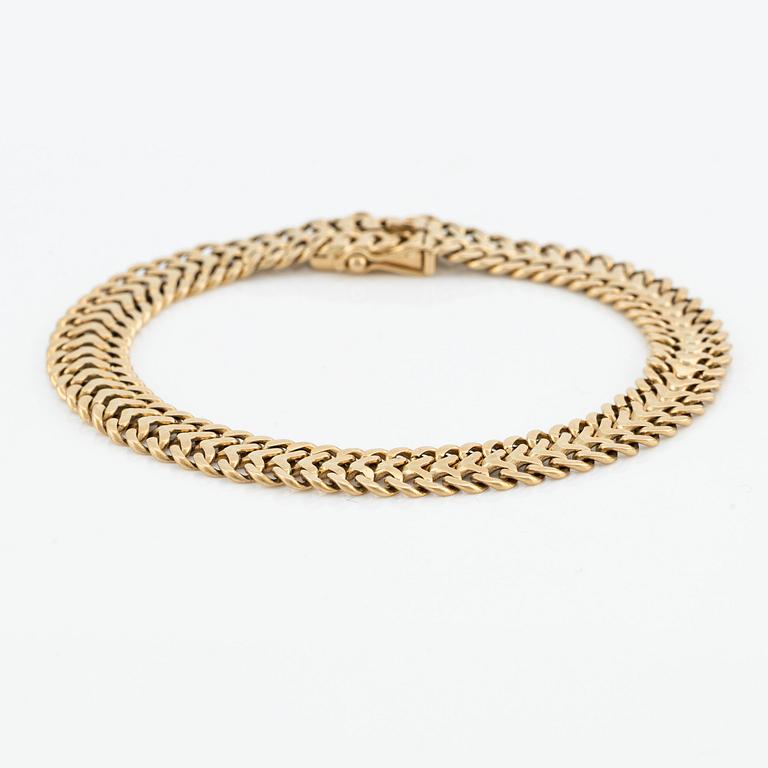 Armlänk, 18K guld, fiskbenslänk.