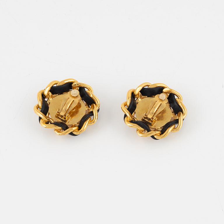 Chanel,  a pair of gold tone clip-on earrings, 1994.