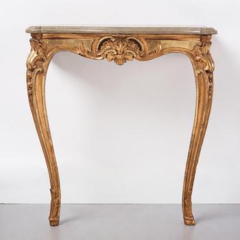 A Swedish giltwood and limestone console table, Stockholm, later part 18th century.