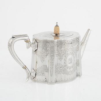 An English Silver Coffee Pot, Teapot, Creamer and Sugar Bowl, mark of Walker & Hall (John Edward Bingham) Sheffield 1891.