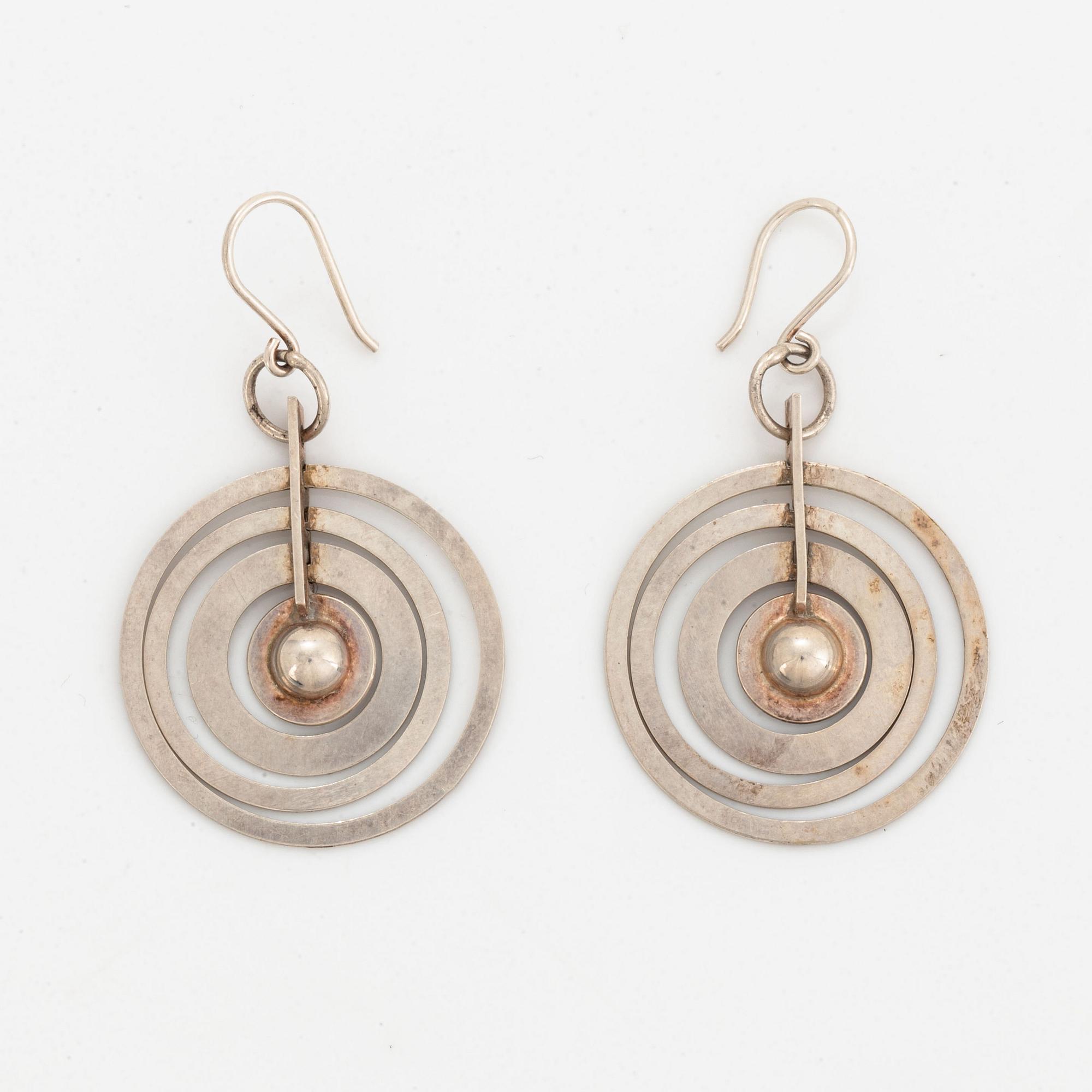 A pair of silver Tapio Wirkkala earrings.