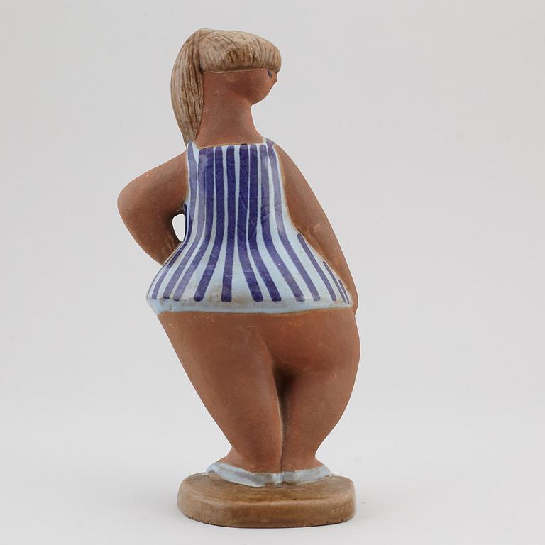 LISA LARSON, a 'Dora' stoneware figurine, from ABC-Flickorna, Gustavsberg.