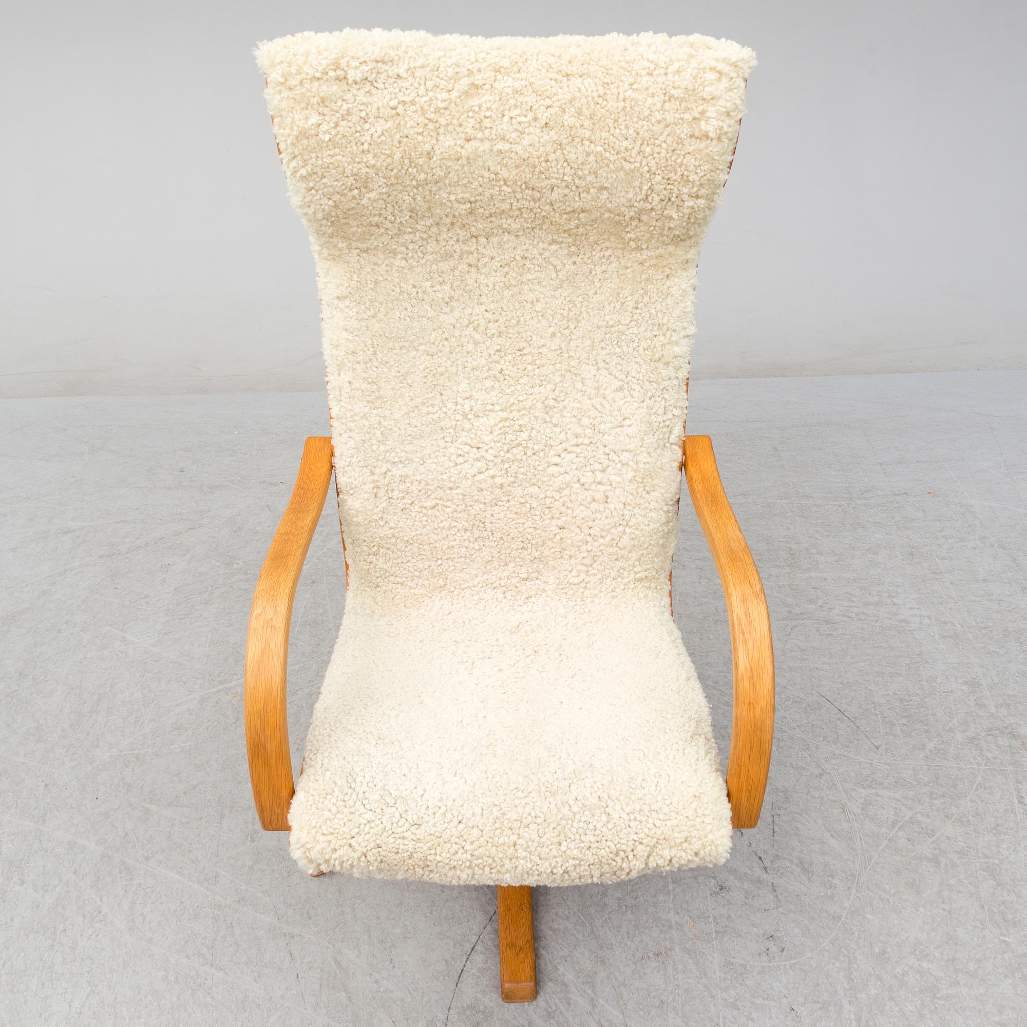 JAN EKSTRÖM, fåtölj med fotpall, "Gazell", Conform.