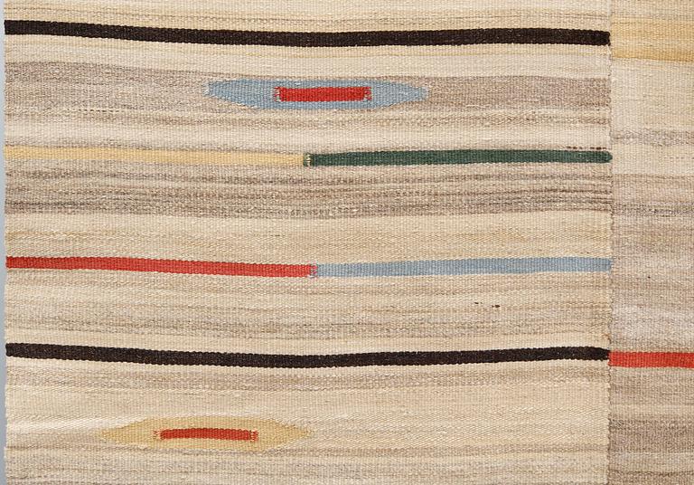 An oriental flat weave carpet, c 315 x 222 cm.