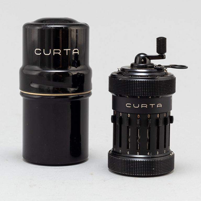 A 'Curta, Type I' calculator developed by Curt Herzstark, Contina AG Mauren, Lichtenstein, designed in 1947.