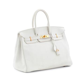 381. HERMÈS, a Tourillon clemence white handbag, "Birkin 35".