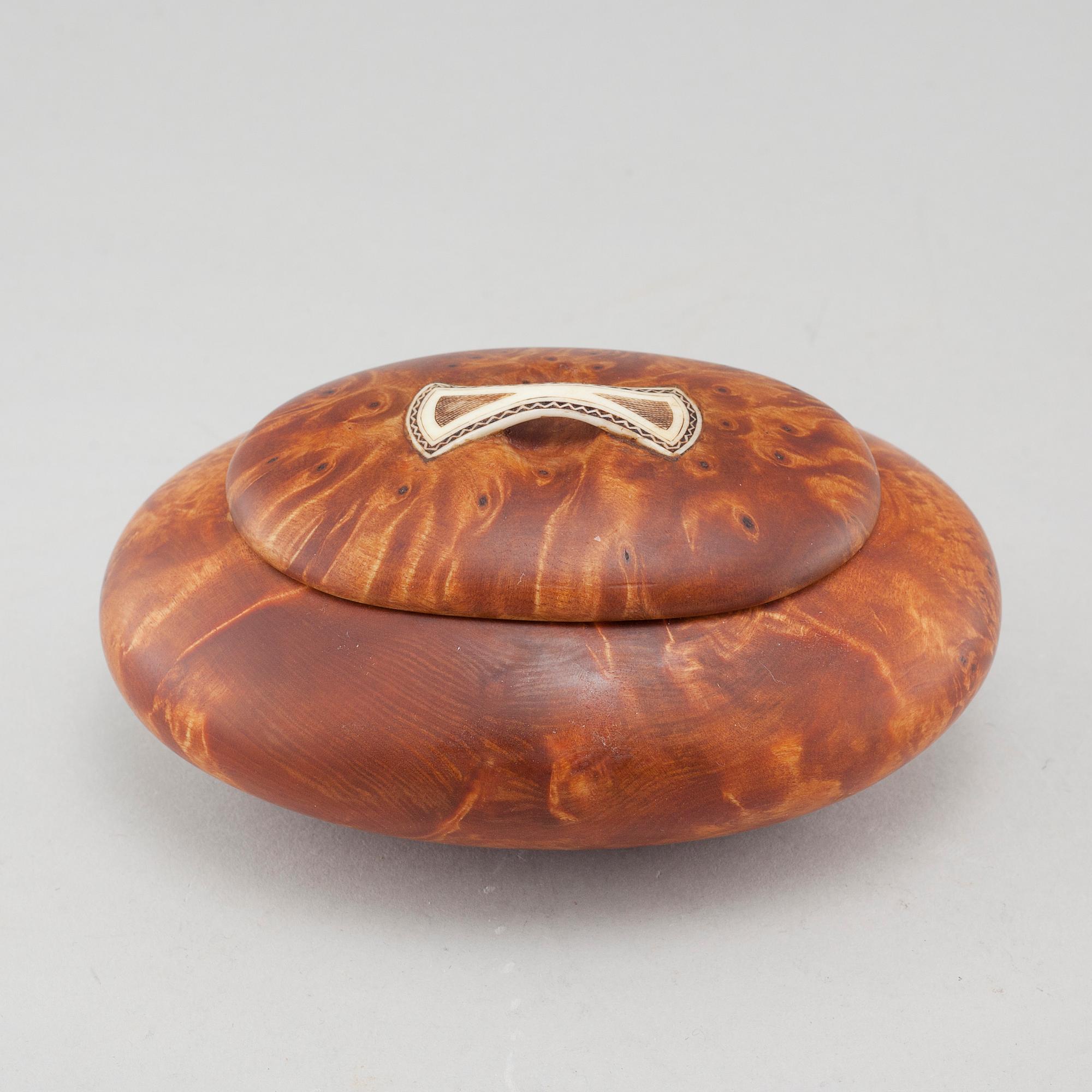 A box, signed M Niia.