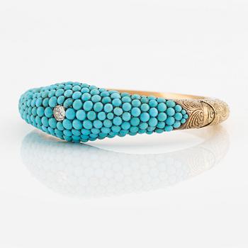 An 18K gold bracelet with turquoises and an old-cut diamond.