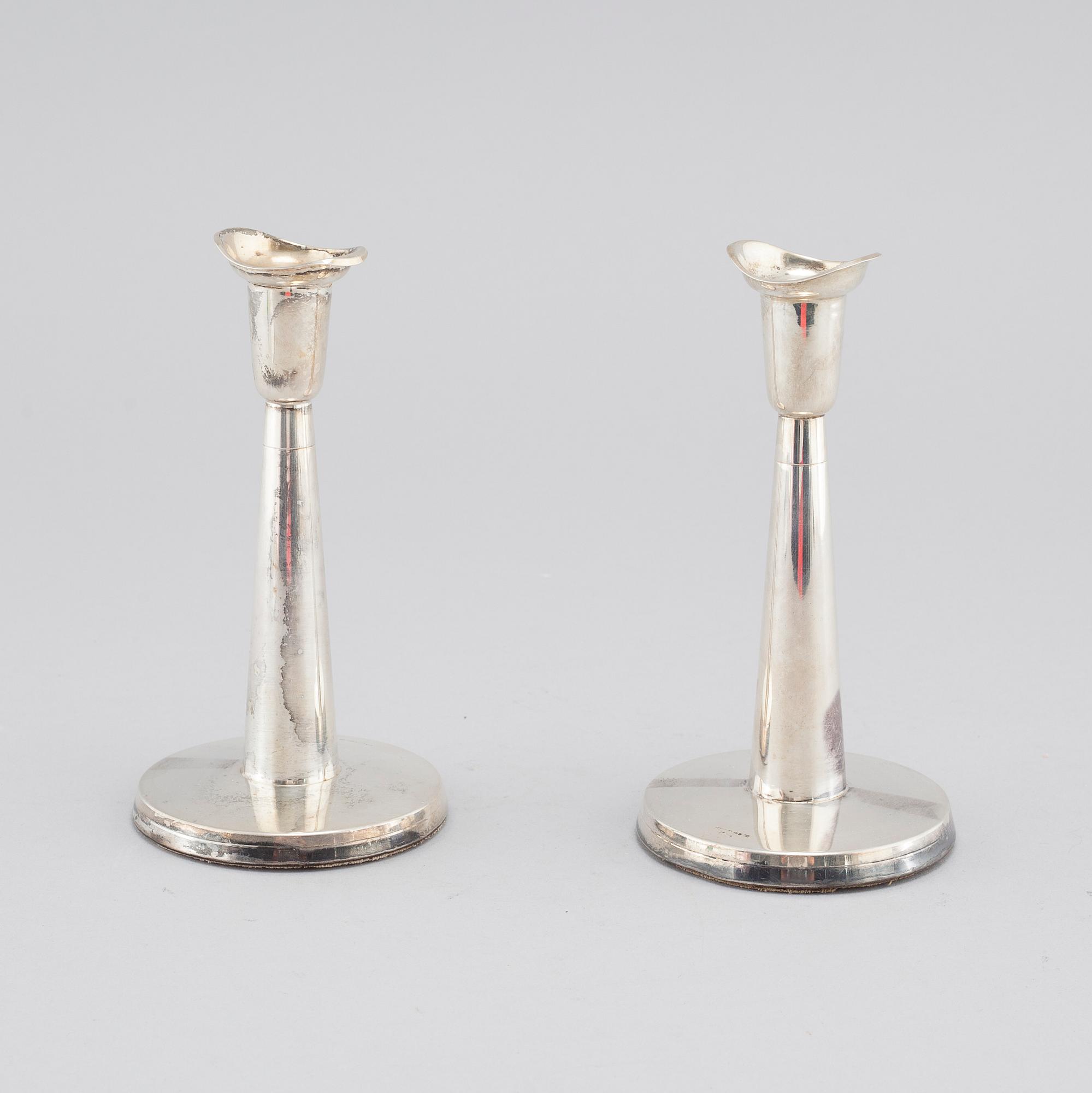 A pair of silver candle sticks by Tore Eld in gothenburg, Sweden, 1959.