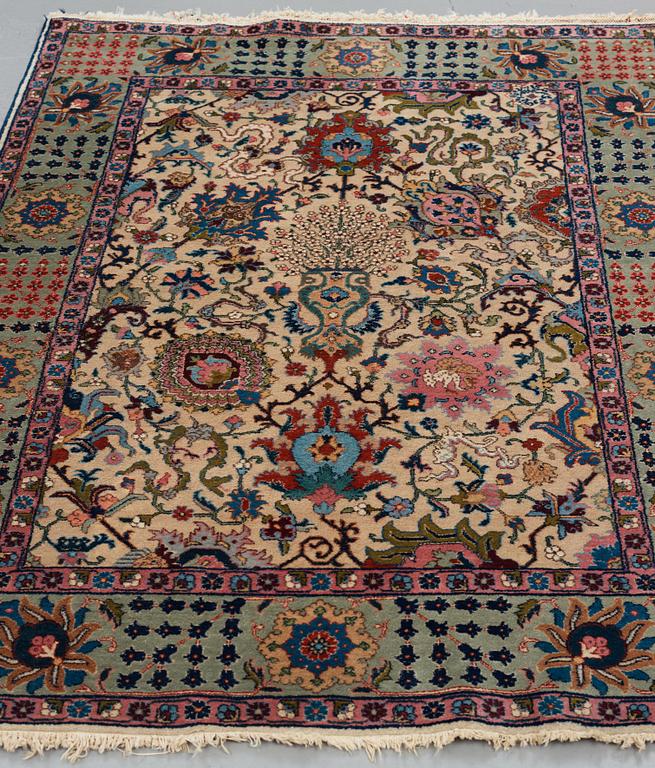 MATTO, a semi-antique Tabriz, ca 198 x 142 cm.