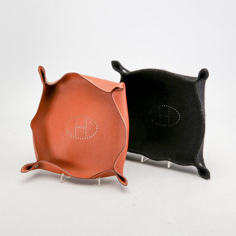 Hermès, a set of two leather and felt "Change trays".